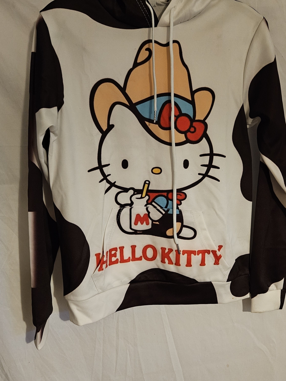 Hello Kitty White & Brown Cow-Print Hoodie with Colorful Graphic